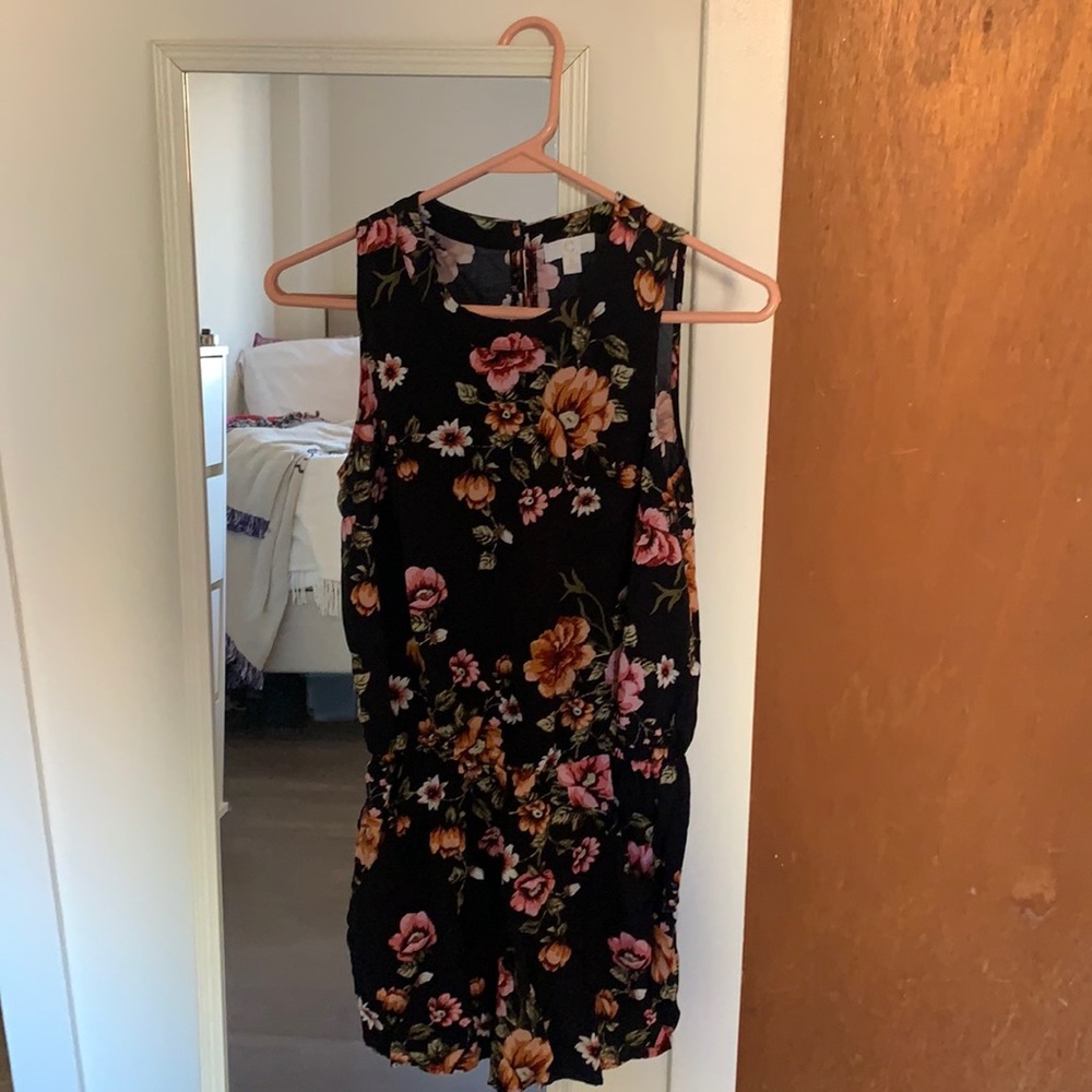 Romper from Charming Charlie, black, floral, high neck. Size s, only worn once